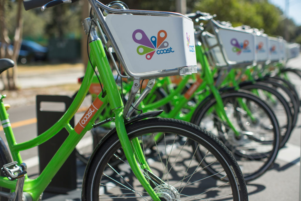 A row of shareable Coast bikes ready to be used around the city