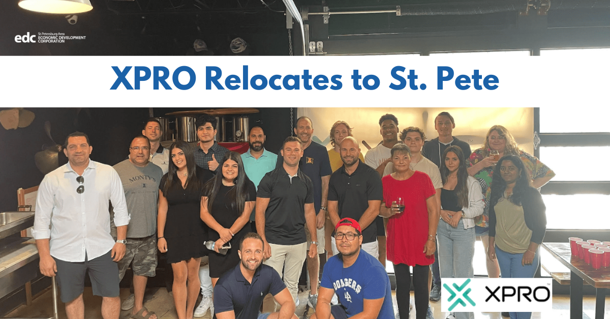 XPRO employees celebrate their company's relocation to St. Petersburg, Florida.